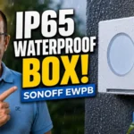 SONOFF EWPB IP65 waterproof box installed on an outdoor wall in the rain